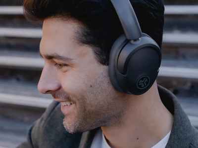 JLab - man wearing over the ear headphones